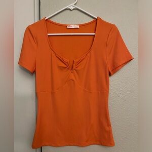 Orange women’s top